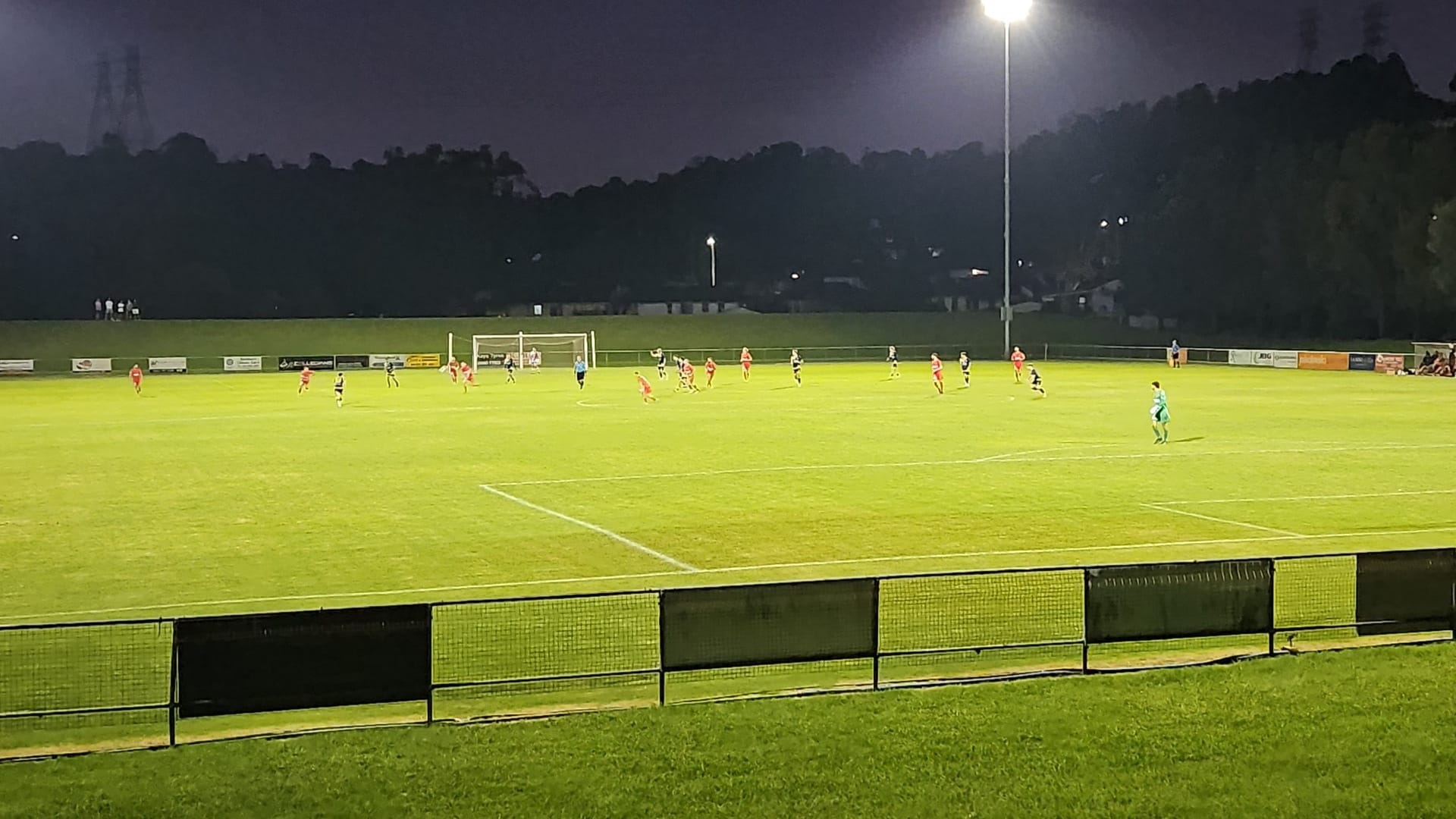 Players on football field